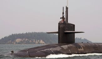 PUGET SOUND, Wash. (Aug. 2, 2017) The Ohio-class ballistic-missile submarine USS Pennsylvania (SSBN 735) transits the Hood Canal as the boat returns to its homeport at Naval Base Kitsap-Bangor following a strategic deterrent patrol. Pennsylvania is one of eight ballistic-missile submarines stationed at the base, providing the most survivable leg of the strategic deterrence triad for the U.S. (U.S. Navy photo by Mass Communication Specialist 1st Class Amanda R. Gray/Released)170802-N-UD469-037