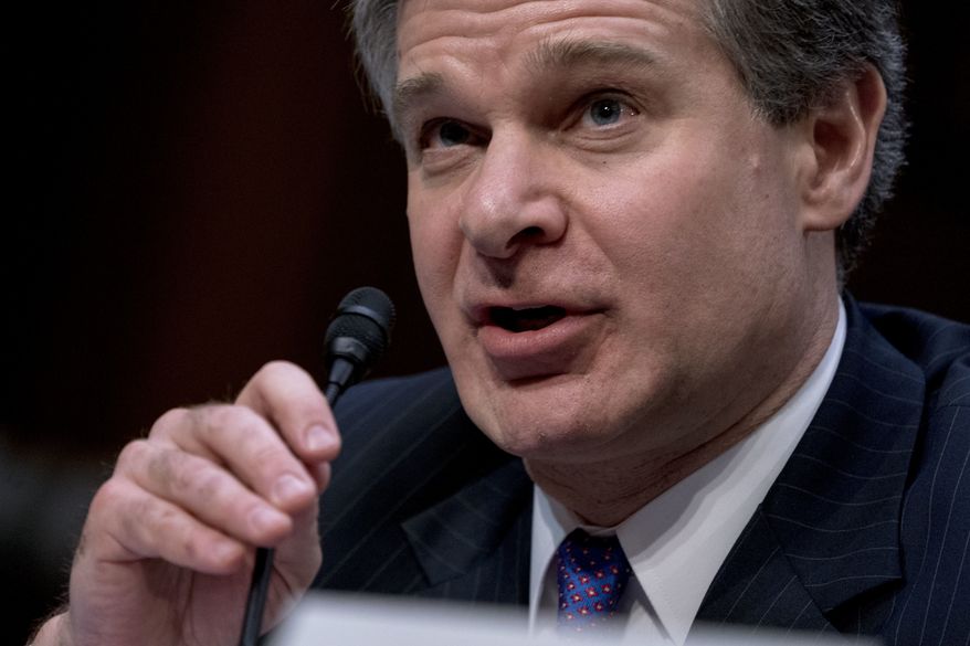 FBI Director Christopher Wray speaks during a Senate Select Committee on Intelligence hearing on worldwide threats, Tuesday, Feb. 13, 2018, in Washington. (AP Photo/Andrew Harnik)