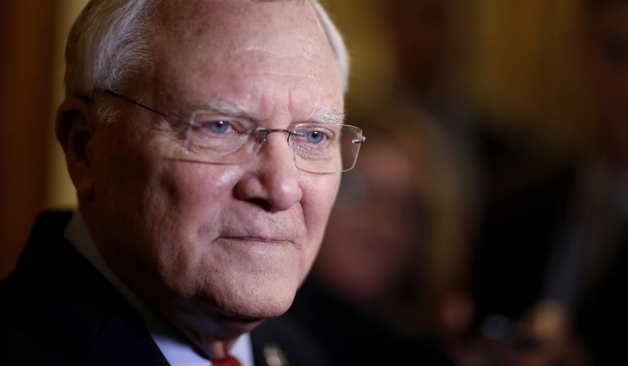 FILE - In this Jan. 11, 2018 file photo, Georgia Gov. Nathan Deal talks to reporters after delivering the State of the State address at the state Capitol in Atlanta. With Atlanta among the 20 cities still being considered for Amazon’s second headquarters, lawmakers and lobbyists are citing the corporate giant in various legislative battles. Two flashpoints have been a “religious liberties” bill _ viewed by some as anti-LGBT _ as well as a trio of bills dubbed by opponents as “adios Amazon” because they’re related to immigration issues. (AP Photo/David Goldman)