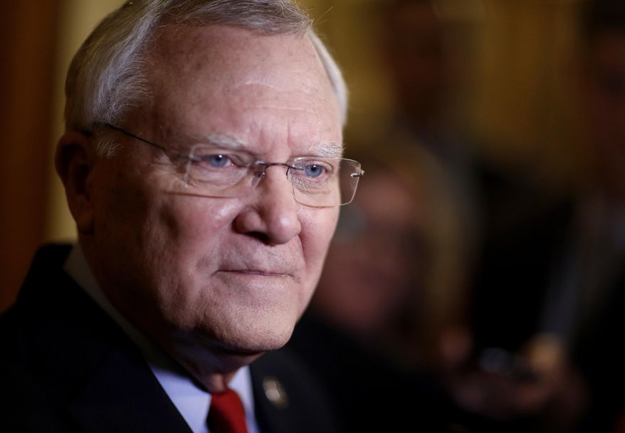 FILE - In this Jan. 11, 2018 file photo, Georgia Gov. Nathan Deal talks to reporters after delivering the State of the State address at the state Capitol in Atlanta. With Atlanta among the 20 cities still being considered for Amazon’s second headquarters, lawmakers and lobbyists are citing the corporate giant in various legislative battles. Two flashpoints have been a “religious liberties” bill _ viewed by some as anti-LGBT _ as well as a trio of bills dubbed by opponents as “adios Amazon” because they’re related to immigration issues. (AP Photo/David Goldman)