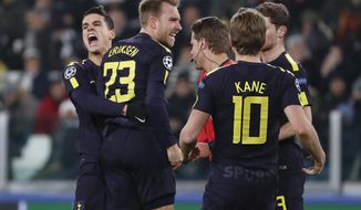 Tottenham&#39;s Christian Eriksen, 2nd left, celebrates with teammate Erik Lamela and Harry Kane, right, after scoring his side&#39;s second goal during the Champions League, round of 16, first-leg soccer match between Juventus and Tottenham Hotspurs, at the Allianz Stadium in Turin, Italy, Tuesday, Feb. 13, 2018. (AP Photo/Antonio Calanni)