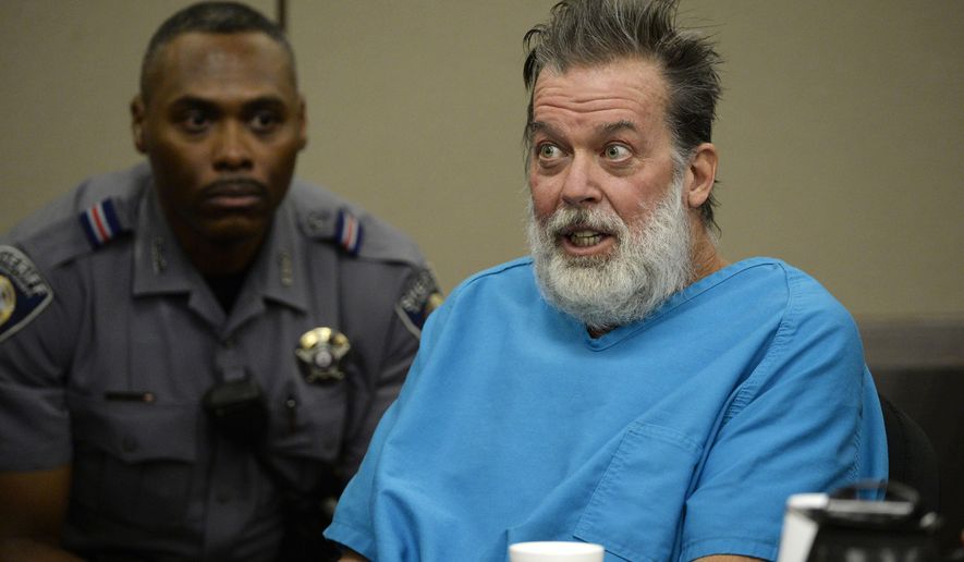 FILE - In this Dec. 9, 2015 file photo, Robert Lewis Dear talks to Judge Gilbert Martinez during a court appearance in Colorado Springs, Colo. A Colorado judge says Dear, who acknowledges killing three people at a Planned Parenthood clinic remains mentally incompetent. The hearing Tuesday, Feb. 13, 2018, was the first review of Robert Dear&#x27;s mental health since the Colorado Court of Appeals in January upheld a lower court&#x27;s ruling that he can be medicated against his will. (Andy Cross/The Denver Post via AP, Pool, File)