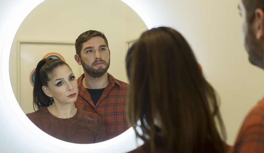 This image released by Sundance Now shows Shoshannah Stern, left, and Josh Feldman in a scene from "This Close," a series premiering Feb. 14 on Sundance Now. (Gunther Campine/Sundance Now via AP)
