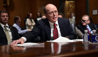 Internal Revenue Service Acting Commissioner David Kautter gathers his papers as he prepares to testify before the Senate Finance Committee on Capitol Hill in Washington, Wednesday, Feb. 14, 2018, on President Donald Trump&#39;s fiscal year 2019 budget proposal. (AP Photo/Susan Walsh) ** FILE **