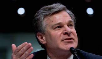 FBI Director Christopher Wray is shown here in this file photo. (Associated Press) **FILE**