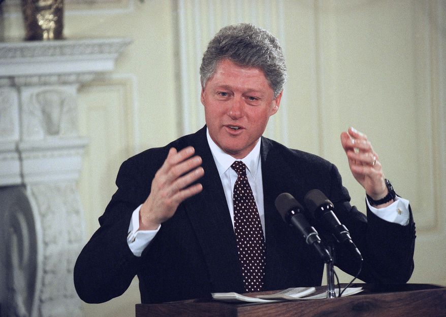 President Bill Clinton, speaking to business leaders at the White House in Washington, Jan. 17, 1994, predicted a &quot;difficult few weeks&quot; for the people of Los Angeles and Southern California. The president promised federal disaster aid for the state. (AP Photo/Wilfredo Lee)