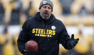 FILE - This Dec. 31, 2017 file photo shows Pittsburgh Steelers offensive coordinator Todd Haley watching warm ups before an NFL football game against the Cleveland Browns in Pittsburgh. After six successful seasons guiding one of the NFL’s most high-powered offenses in Pittsburgh, Haley is starting anew in Cleveland with the winless Browns, a team he once reviled but has always respected. (AP Photo/Keith Srakocic, file)