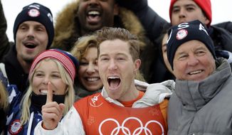 Shaun White, of the United States, celebrates winning gold after the men&#39;s halfpipe finals at Phoenix Snow Park at the 2018 Winter Olympics in Pyeongchang, South Korea, Wednesday, Feb. 14, 2018. (AP Photo/Lee Jin-man)