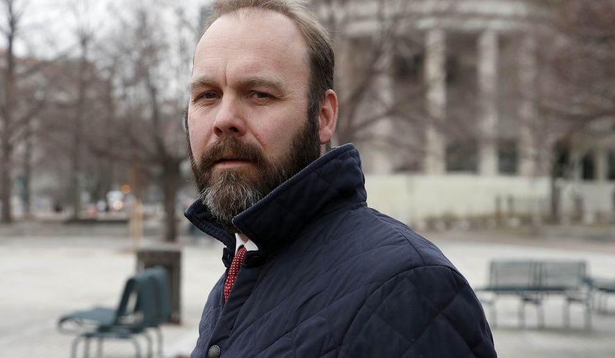 Rick Gates departs Federal District Court, Wednesday, Feb. 14, 2018, in Washington. Paul Manafort, the former campaign chairman for President Donald Trump, and his business associate Rick Gates were in federal court on Wednesday for a routine status conference. Both were indicted in October on charges stemming from foreign lobbying work in Ukraine. (AP Photo/Alex Brandon)