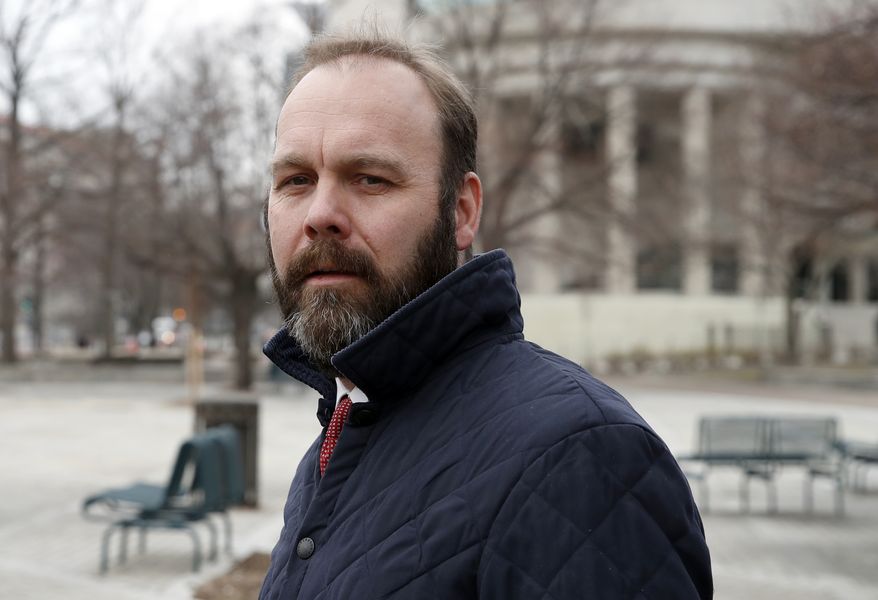 Rick Gates departs Federal District Court, Wednesday, Feb. 14, 2018, in Washington. Paul Manafort, the former campaign chairman for President Donald Trump, and his business associate Rick Gates were in federal court on Wednesday for a routine status conference. Both were indicted in October on charges stemming from foreign lobbying work in Ukraine. (AP Photo/Alex Brandon)
