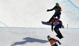 From bottom to top; Pierre Vaultier, of France, Jarryd Hughes, of Australia, Markus Schairer, of Austria, and Hanno Douschan, of Austria, runs the course during the men&#39;s snowboard cross elimination round at Phoenix Snow Park at the 2018 Winter Olympics in Pyeongchang, South Korea, Thursday, Feb. 15, 2018. (AP Photo/Gregory Bull)