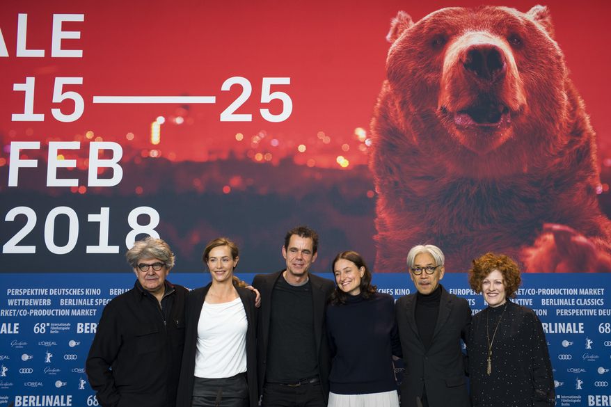 From left: Chema Prado, Cecile de France, Tom Tykwer, Adele Romanski, Ryuichi Sakamoto and Stephanie Zacharek, the members of the jury of the International Film Festival Berlin, Berlinale, pose after a news conference in Berlin, Thursday, Feb. 15, 2018. (AP Photo/Markus Schreiber)