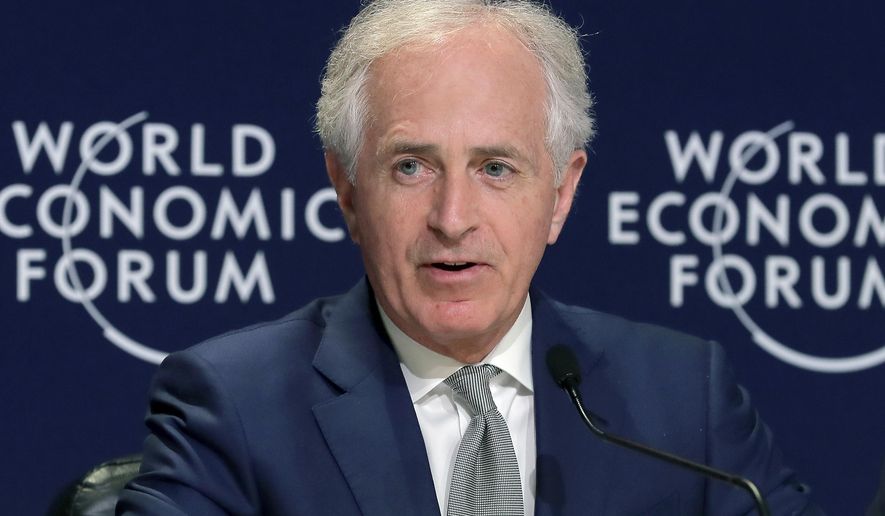 FILE - In this Jan. 24, 2018, file photo, Sen Bob Corker, R-Tenn., speaks at a news conference at the World Economic Forum in Davos, Switzerland. Corker says he will no longer block Persian Gulf nations from buying American-made lethal weapons even though the diplomatic crisis between Qatar and its neighbors remains in a stalemate.. (AP Photo/Markus Schreiber, File)