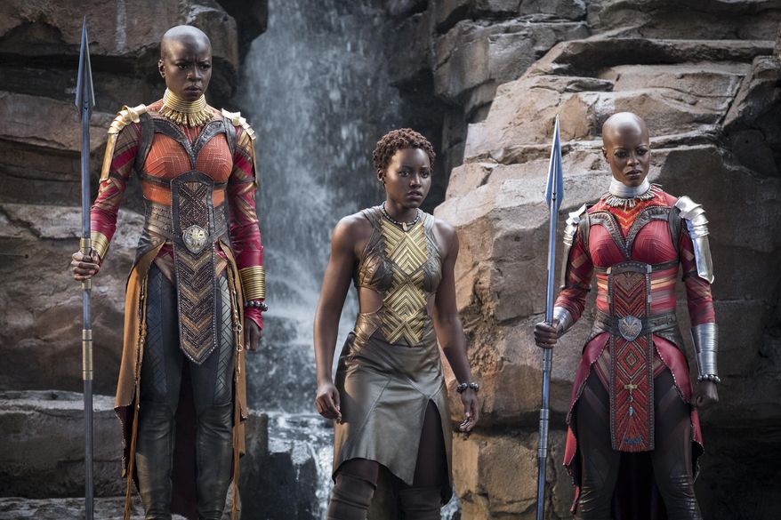 This image released by Disney -Marvel Studios shows, from left, Danai Gurira, Lupita Nyong'o and Florence Kasumba in a scene from "Black Panther." Gurira says the representation of women in “Black Panther” is important for young girls to see. The film features a number of powerful female leads, including Gurira as the head of a special forces unit, Lupita Nyong’o as a spy, Angela Bassett as the Queen Mother and newcomer Letitia Wright as a scientist and inventor. (Matt Kennedy/Disney/Marvel Studios via AP)