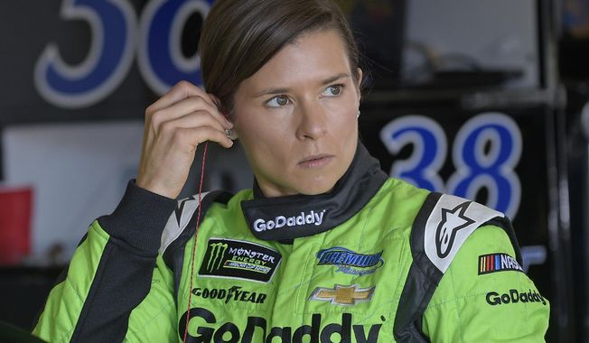 Danica Patrick prepares for practice for the NASCAR Daytona 500 Cup Series auto race at Daytona International Speedway in Daytona Beach, Fla., Saturday, Feb. 17, 2018. Patrick has one last chance at a win in NASCAR, on its biggest stage, at the Daytona 500. She will run only that event, then focus on the Indianapolis 500 before she retires as a race car driver. (AP Photo/Phelan M. Ebenhack)