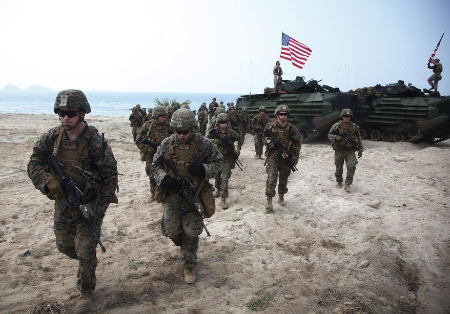U.S. Marines join in an ongoing U.S.-Thai joint Cobra Gold U.S.-Thai joint military exercise on Hat Yao beach in Chonburi province, eastern Thailand, Saturday, Feb. 17, 2018. Approximately 11,000 military personnel from the U.S., Thailand, and South Korea are taking part in the annual drill. (AP Photo/Sakchai Lalit) **FILE**