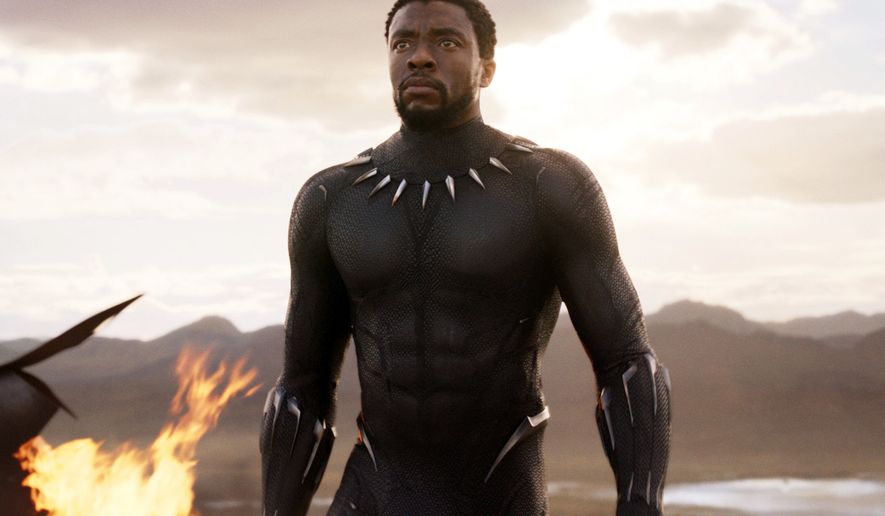 This image released by Disney and Marvel Studios&#39; shows Chadwick Boseman in a scene from &quot;Black Panther.&quot; (Marvel Studios/Disney via AP)