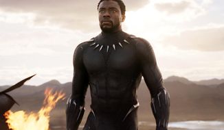 This image released by Disney and Marvel Studios&#39; shows Chadwick Boseman in a scene from &amp;quot;Black Panther.&amp;quot; (Marvel Studios/Disney via AP)
