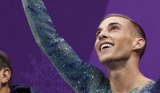 Adam Rippon of the United States reacts as his score is posted following his performance in the men&#39;s free figure skating final in the Gangneung Ice Arena at the 2018 Winter Olympics in Gangneung, South Korea, Saturday, Feb. 17, 2018. (AP Photo/Bernat Armangue) **FILE**