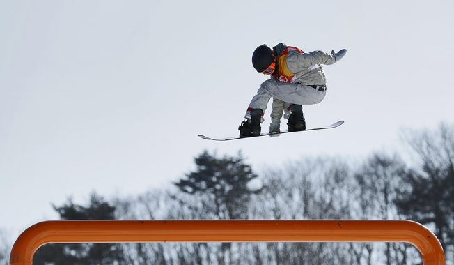Red Gerard, of the United States, jumps during the men&#x27;s slopestyle final at Phoenix Snow Park at the 2018 Winter Olympics in Pyeongchang, South Korea, Sunday, Feb. 11, 2018. (AP Photo/Gregory Bull)