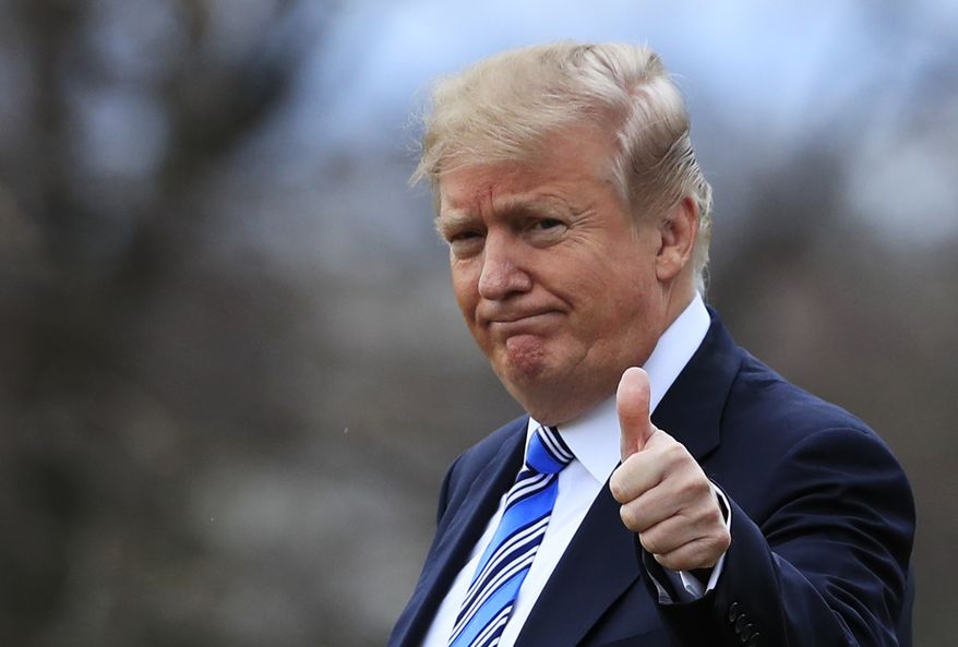 President Donald Trump gestures to the media as he leaves the White House, Friday, Feb. 16, 2018, in Washington, for a trip to his private Mar-a-Lago resort in Florida. (AP Photo/Manuel Balce Ceneta)