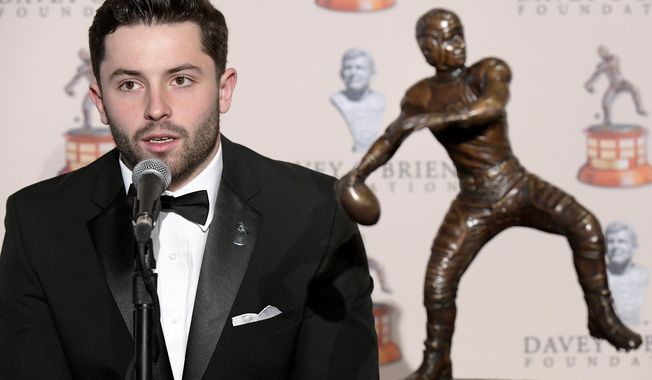 The Davey O&#x27;Brien National Quarterback Award winner Baker Mayfield speaks during a news conference at the Fort Worth Club in Fort Worth, Texas, Monday, Feb. 19, 2018. (Max Faulkner/Star-Telegram via AP)