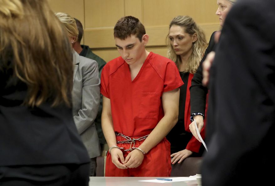 Nikolas Cruz appears in court for a status hearing before Broward Circuit Judge Elizabeth Scherer in Fort Lauderdale, Fla., Monday, Feb. 19, 2018. Cruz is charged with killing 17 people and wounding many others in Wednesday's attack at Marjory Stoneman Douglas High School in Parkland, which he once attended. (Mike Stocker/South Florida Sun-Sentinel via AP, Pool)