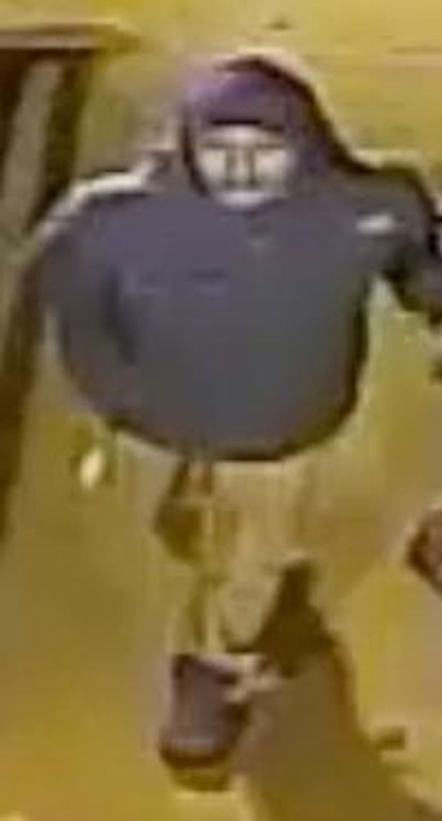 This image taken from a Feb. 24, 2015 surveillance video and provided on Feb. 17, 2018 by the New York City Police Department, shows a man being sought by the NYPD in connection with a rape three years ago. New York detectives are again asking for help in solving the 2015 rape of a 12-year-old school girl who was brutally attacked in the Bronx. (NYPD via AP)