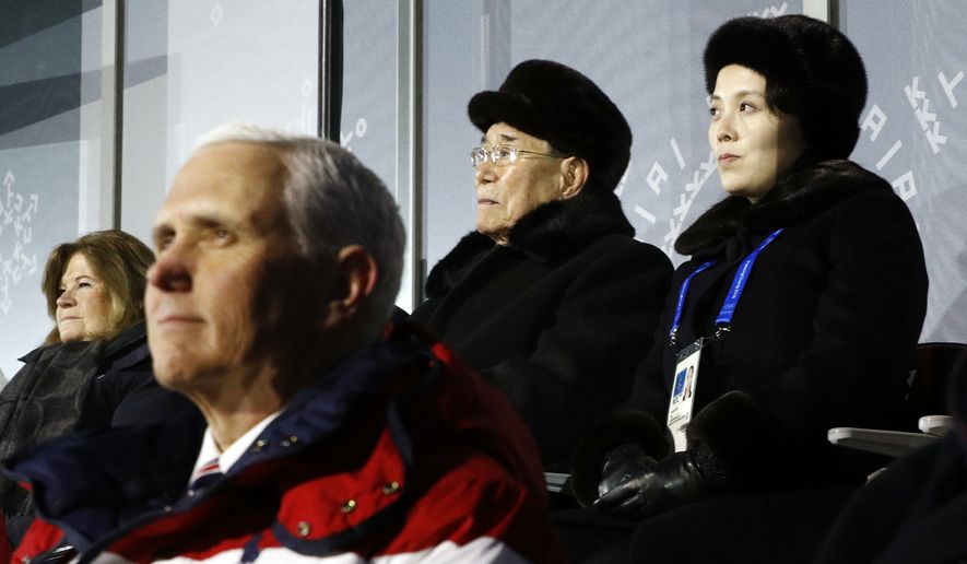 Kim Yo Jong, top right, sister of North Korean leader Kim Jong Un, sits alongside Kim Yong Nam, president of the Presidium of North Korean Parliament, and behind U.S. Vice President Mike Pence as she watches the opening ceremony of the 2018 Winter Olympics in Pyeongchang, South Korea, Friday, Feb. 9, 2018. (AP Photo/Patrick Semansky, Pool)