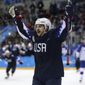 Garrett Roe (11), of the United States, celebrates after scoring a goal against Slovakia during the third period of the qualification round of the men&#39;s hockey game at the 2018 Winter Olympics in Gangneung, South Korea, Tuesday, Feb. 20, 2018. (AP Photo/Julio Cortez)