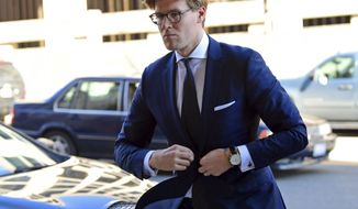 Alex van der Zwaan arrives at Federal District Court in Washington, Tuesday, Feb. 20, 2018. Van der Zwaan has been accused of lying to investigators about his interactions with Rick Gates, who was indicted last year along with Paul Manafort, President Donald Trump&#39;s campaign chairman, on charges of conspiracy to launder money and acting as an unregistered foreign agent. (AP Photo/Susan Walsh)