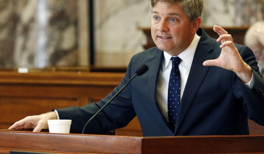 Senate Finance Committee chairman Joey Fillingane, R-Sumrall, explains elements of Senate Bill 3046, which increases infrastructure spending by more than $1 billion through 2023, during floor debate in Senate chambers at the Capitol in Jackson, Miss., Tuesday, Feb. 20, 2018. The bill passed. (AP Photo/Rogelio V. Solis)