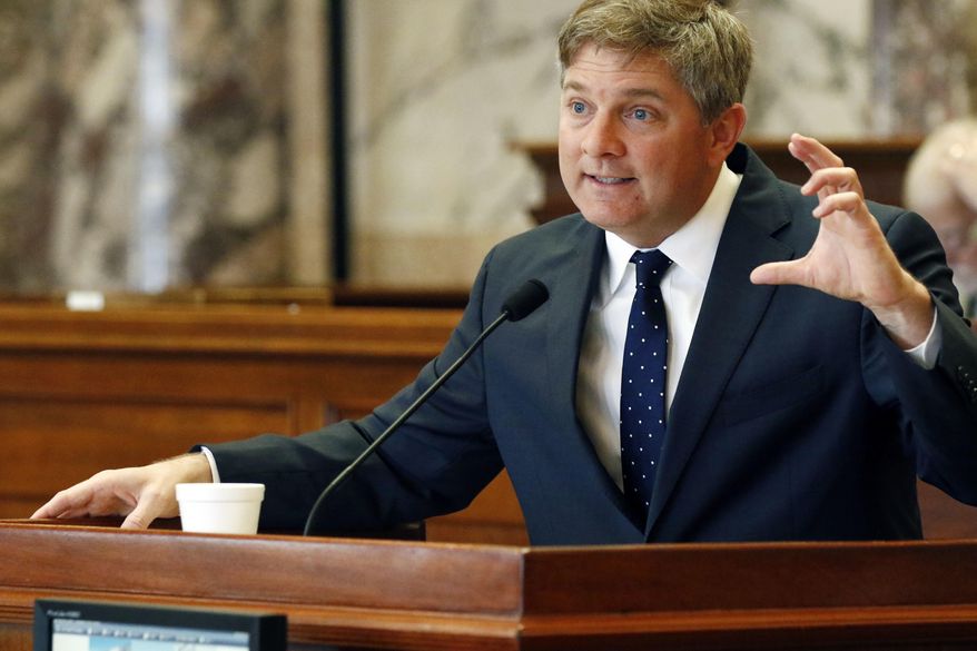 Senate Finance Committee chairman Joey Fillingane, R-Sumrall, explains elements of Senate Bill 3046, which increases infrastructure spending by more than $1 billion through 2023, during floor debate in Senate chambers at the Capitol in Jackson, Miss., Tuesday, Feb. 20, 2018. The bill passed. (AP Photo/Rogelio V. Solis)