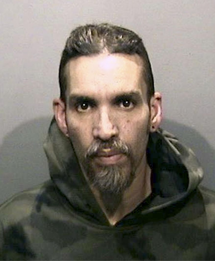 FILE - This June 5, 2017, file photo released by the Alameda County Sheriff's Office shows Derick Almena at Santa Rita Jail in Alameda County, Calif. An Alameda County Superior Court judge on Tuesday, Feb. 20, 2018, set a July 16 trial date for Almena and Max Harris, who the judge previously said had a "substantial" role in managing the Ghost Ship warehouse.(Alameda County Sheriff's Office via AP, File)