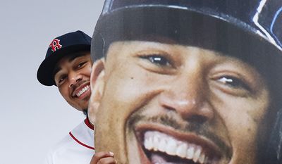 MOOKIE BETTS - Boston Red Sox right fielder Mookie Betts poses for a photograph during the team&#39;s photo day at spring training baseball, Tuesday, Feb. 20, 2018, in Fort Myers, Fla. (AP Photo/John Minchillo)