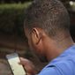An estimated 19 million low-income Ugandans have effectively lost access to Facebook, WhatsApp, Skype and other apps as a result on the Ugandan tax, which took effect on July 1. (Associated Press/File)