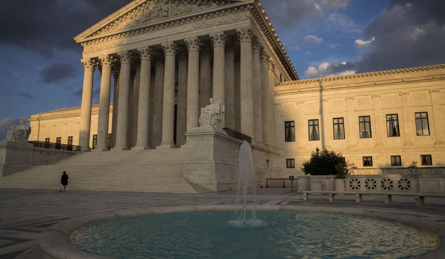 In this Oct. 10, 2017, file photo, the Supreme Court in Washington is seen at sunset. (AP Photo/J. Scott Applewhite) ** FILE **