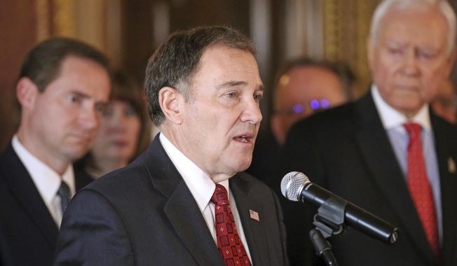 Utah Gov. Gary Herbert speaks during a news conference at the Utah state Capitol, Tuesday, Feb. 20, 2018, in Salt Lake City. A new task force created to try and slow a troubling rise of teen suicides in Utah is recommending that officials ratchet up public messaging to implore gun-owing parents to keep firearms locked up. (AP Photo/Rick Bowmer)