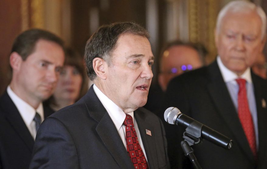Utah Gov. Gary Herbert speaks during a news conference at the Utah state Capitol, Tuesday, Feb. 20, 2018, in Salt Lake City. A new task force created to try and slow a troubling rise of teen suicides in Utah is recommending that officials ratchet up public messaging to implore gun-owing parents to keep firearms locked up. (AP Photo/Rick Bowmer)