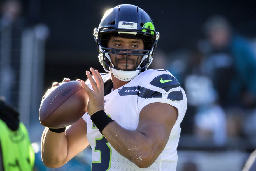 Seattle Seahawks quarterback Russell Wilson (3) warms up before the start an NFL football game against the Jacksonville Jaguars, Sunday, Dec. 10, 2017, in Jacksonville, Fla. (AP Photo/Stephen B. Morton)