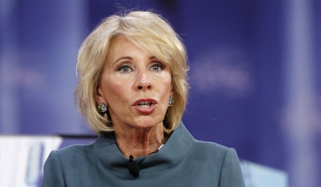 Education Secretary Betsy DeVos speaks during the Conservative Political Action Conference (CPAC), at National Harbor, Md., Thursday, Feb. 22, 2018. (AP Photo/Jacquelyn Martin)