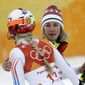 Mikaela Shiffrin, of the United States, right, hugs compatriot Lindsey Vonn after the women&#39;s combined slalom at the 2018 Winter Olympics in Jeongseon, South Korea, Thursday, Feb. 22, 2018. (AP Photo/Michael Probst)