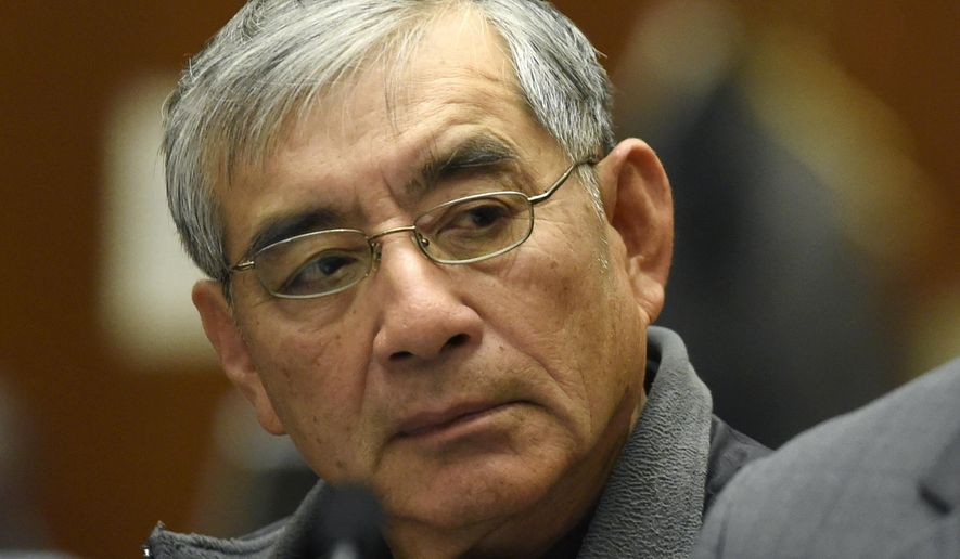 ADDS TO CLARIFY - IN ILLEGAL CAMPAIGN CONTRIBUTIONS TO COMMITTEES THAT SUPPORTED Real estate developer Samuel Leung appears in court as he faces charges of making nearly $200,000 in illegal campaign contributions to committees that supported Los Angeles Mayor Eric Garcetti and other Los Angeles politicians, in Los Angeles County Superior Court on Friday, Feb. 23, 2018, in Los Angeles. (AP Photo/Chris Pizzello)