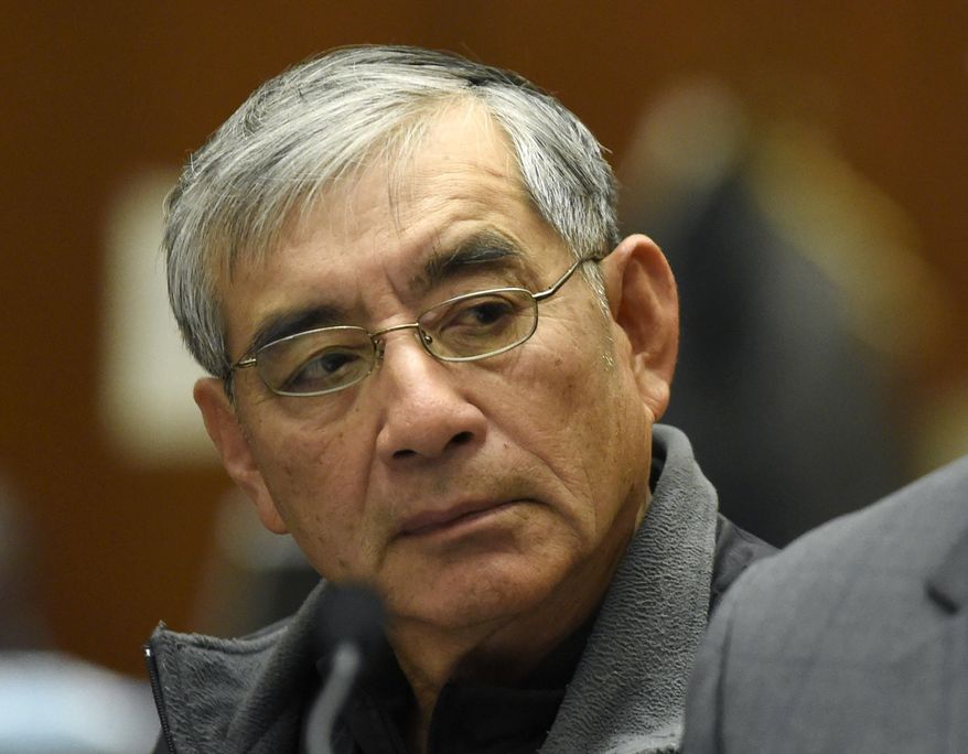 ADDS TO CLARIFY - IN ILLEGAL CAMPAIGN CONTRIBUTIONS TO COMMITTEES THAT SUPPORTED Real estate developer Samuel Leung appears in court as he faces charges of making nearly $200,000 in illegal campaign contributions to committees that supported Los Angeles Mayor Eric Garcetti and other Los Angeles politicians, in Los Angeles County Superior Court on Friday, Feb. 23, 2018, in Los Angeles. (AP Photo/Chris Pizzello)