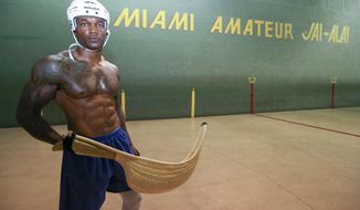 Former University of Miami student athlete alumni Tanard Davis poses for the photo during training at American Amateur Jai Alai on Thursday, Feb.  8, 2018 in Miami. Now nearly extinct, jai-alai was once hugely popular up and down the Eastern Seaboard, especially in Miami, where the fronton was known as &amp;quot;the Yankee Stadium of Jai-Alai.&amp;quot; In its heyday, in the 1970s and early &#39;80s, crowds of thousands showed up to drink, smoke cigars, and see their favorite one-named stars, with long, curved baskets (&amp;quot;cestas&amp;quot;) strapped to their hands, hurling the goatskin ball (&amp;quot;pelota&amp;quot;) against the court walls at speeds up to 170 mph.   (David Santiago/Miami Herald via AP)