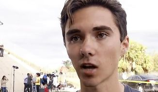 FILE- In this Feb. 15, 2018, file image made from video, David Hogg talks about his experiences at Marjory Stoneman Douglas High when a gunman opened fire and killed over a dozen students and faculty in Parkland, Fla. Hogg and Emma Gonzalez, two students who survived the Florida school shooting and spoke publicly about it, are not &amp;quot;crisis actors,&amp;quot; despite the claims of several conspiracy-oriented sites and an aide to a Florida lawmaker. (AP Photo/Joshua Replogle, File)