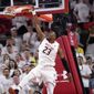 Maryland forward Bruno Fernando (23) dunks against Michigan forward Isaiah Livers (4) during the first half of an NCAA college basketball game, Saturday, Feb. 24, 2018, in College Park, Md. (AP Photo/Nick Wass) ** FILE **