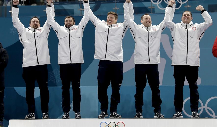 Gold medal winners from left: United States&#39; curlers Joe Polo, John Landsteiner, Matt Hamilton, Tyler George, John Shuster and captain Phill Drobnick celebrate during the men&#39;s curling venue ceremony at the 2018 Winter Olympics in Gangneung, South Korea, Saturday, Feb. 24, 2018. (AP Photo/Natacha Pisarenko)