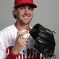 File-This Feb. 20, 2018, file photo shows Aaron Nola of the Philadelphia Phillies baseball team. Gabe Kapler isn&#39;t one to wait. Nola will be his first opening-day starter as Philadelphia Phillies manager. &amp;quot;Barring anything crazy happening, he&#39;s our guy. He is the man,&amp;quot; Kapler said after Nola pitched two innings in his spring-training debut Sunday, Feb. 25, 2018, an 8-3 loss to the New York Yankees. (AP Photo/Lynne Sladky, File)