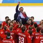 Olympic athletes from Russia celebrate with their coach Oleg Znarok after winning the men&#39;s gold medal hockey game against Germany, 4-3, in overtime at the 2018 Winter Olympics, Sunday, Feb. 25, 2018, in Gangneung, South Korea. (AP Photo/Jae C. Hong) **File**